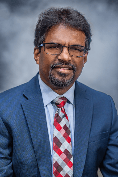 Prof. Tamil Laxman